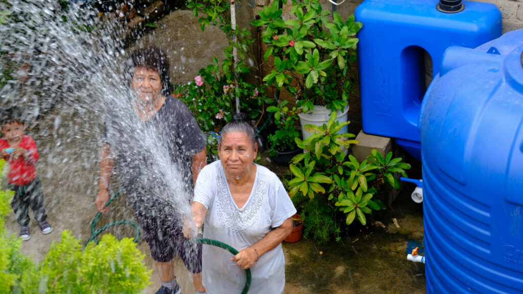 The Nidos de Lluvia (Rain Nests) programme on Monday, Oct. 3, 2022 in Guadalajara, Mexico. The programme aims to improve water access by installing rainwater harvesting systems; they collect rainwater and channel it through filters for cleaning and storage.16 million litres of water were collected via 600 harvesting systems, providing water to over 2,000 residents in 2021. (Refugio Ruiz/AP Images for C40)