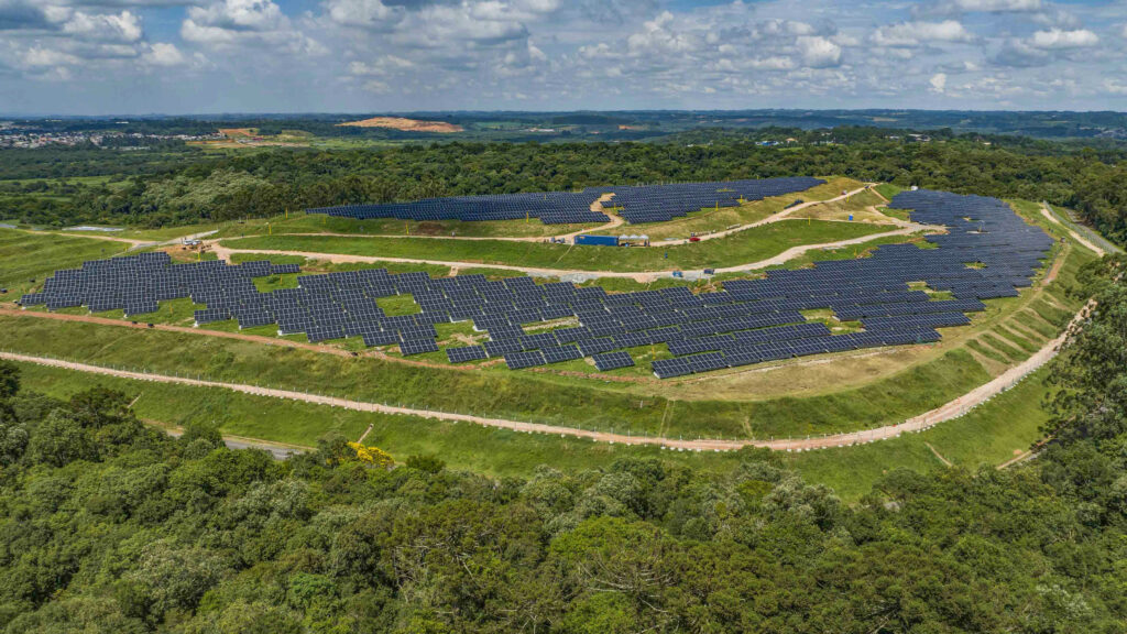 Hundreds of solar panels fill a former landfill site in Curitiba