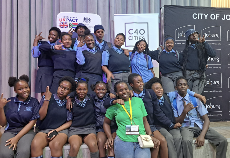 Group photo of Johannesburg youth posed smiling at youth expo event.